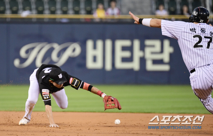 'The ball is alive and moving...' It's an easy double play, but the ball bounces out of the glove, hits the runner and rolls to the outfield. Even 'killer' has no business for mistakes