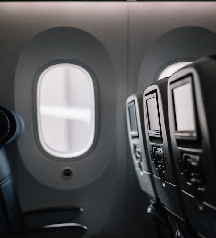 Why You Shouldn't Lean On An Airplane Window