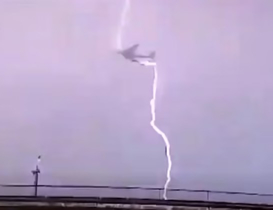 A series of lightning strikes on the plane...It went through with the sound of an explosion