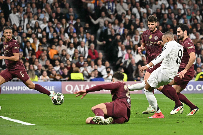 Who's Holan? Mbappe, hat-trick one-man show in front of 1% Guardiola...Real Defeat Man City 31 to advance to the round of 16