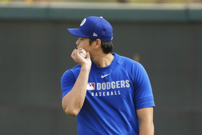 A pitcher who has had Tommy John surgery twice, only two successful cases, and is he careful because he took a bullpen session off for 8 days?