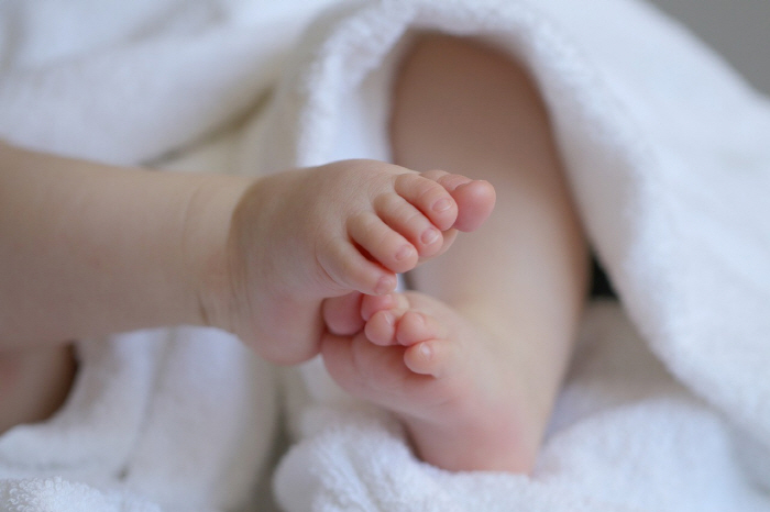 Sleeping with the hairdryer on...Cut 3 Newborn Toes