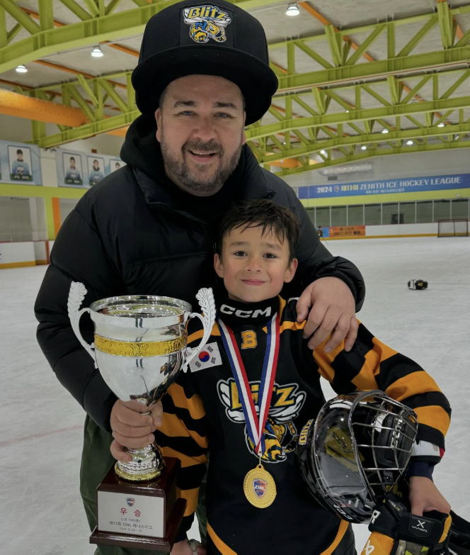 Sam Hammington William, ice hockey player at age 9..a surprise at one's height