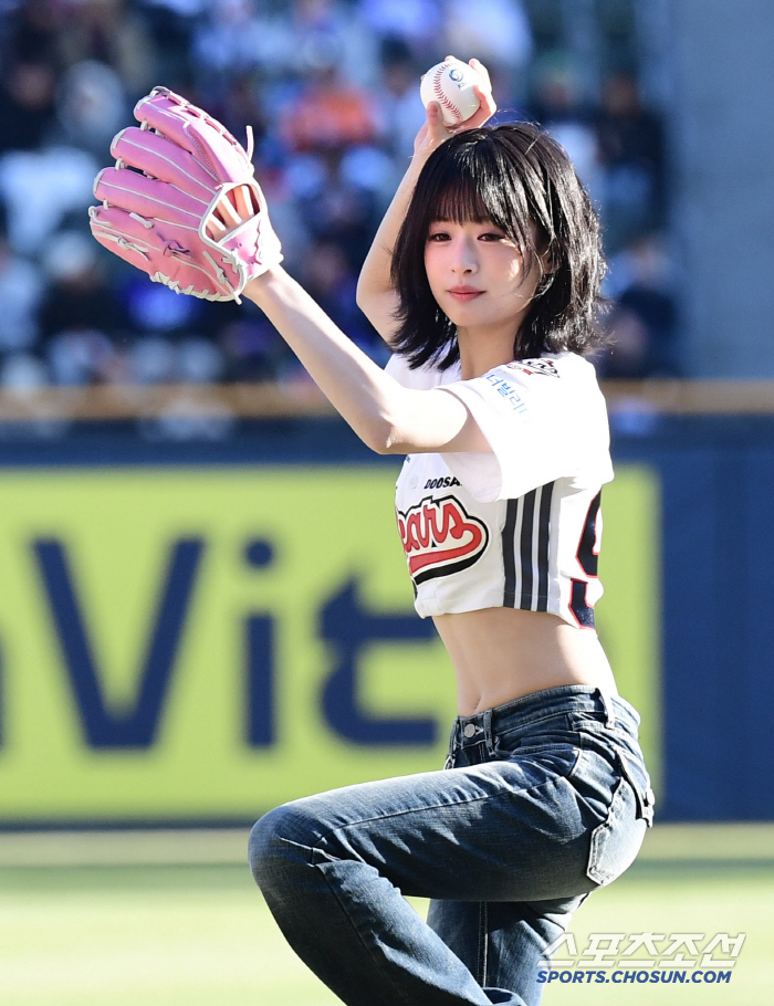 Ahyun, a baby monster, with pink gloves on
