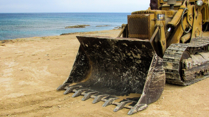 Beach sunbathing woman killed under heavy equipment...The lifeguard we saw fainted