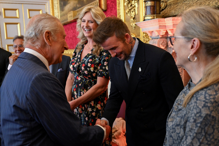 Please give me a warning Beckham, you've become a real legend... a knighthood