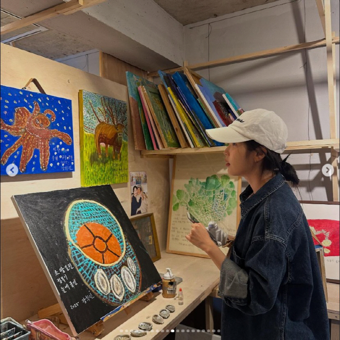 IU Reunites with Jeju Grandmother Artists, Keeping Her Promise with Heartfelt Visit