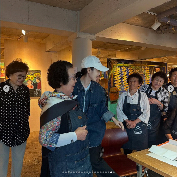 IU Reunites with Jeju Grandmother Artists, Keeping Her Promise with Heartfelt Visit