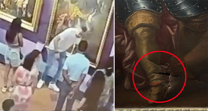 I sprained while taking a picture...a hole in a painting that is more than 300 years old