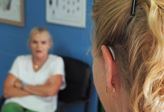 A raspy voice, maybe not just aging...If it lasts more than two weeks, go to the hospital