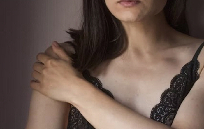 Habit of sleeping sideways, ruining your shoulders...It's hard to wash your hair or wear clothes