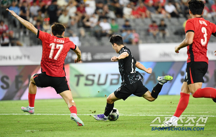  Kang Sangyoon scores the first goal