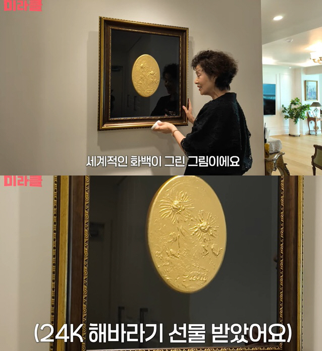 Yoon Mi-ra, a 24K sunflower painting at the entrance of the house, is a world-class artist