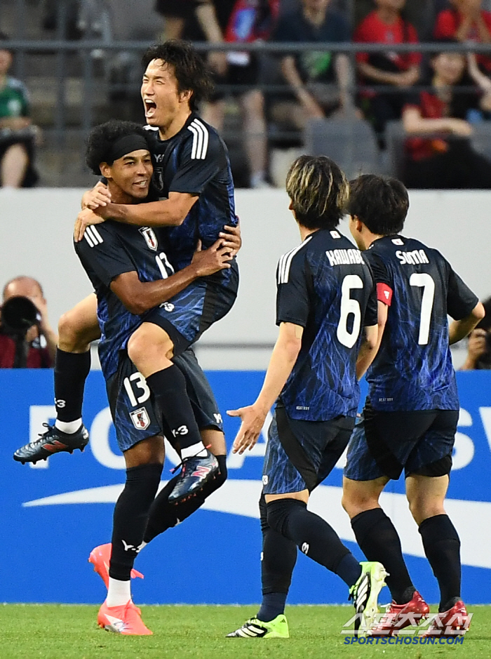  Japan's Germain Scores First Goal