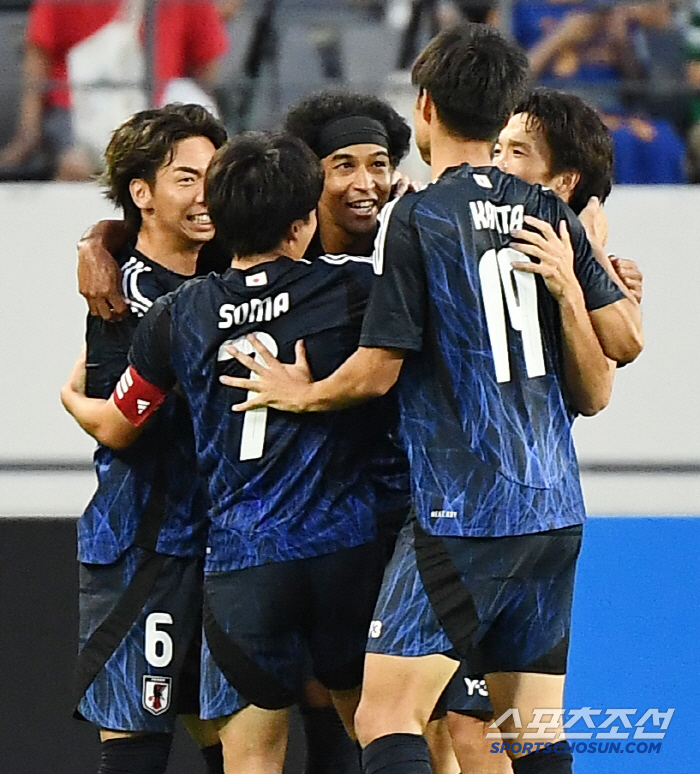  Japan's Germain Scores First Goal