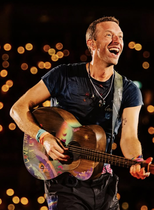 I'm putting on makeup now...Coldplay warns of affair live 