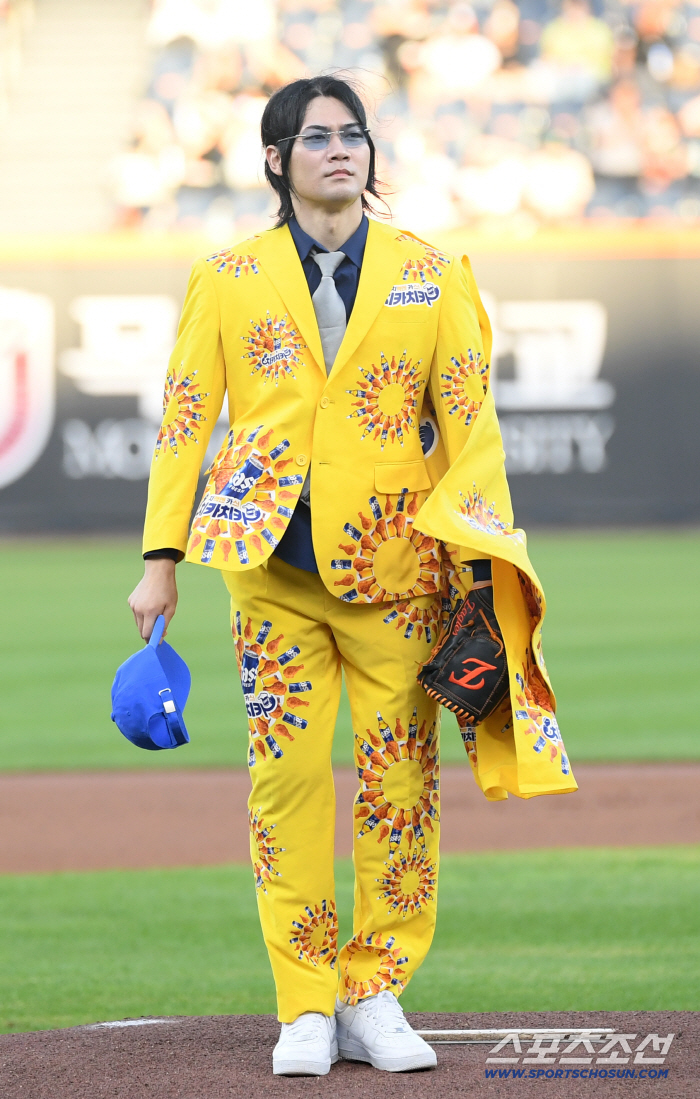  First pitch wearing NiMol Cash's unique outfit