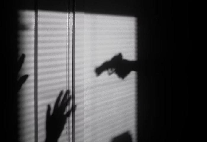 Because I love you... Woman who attempted to kill her lover's business rival with a pistol