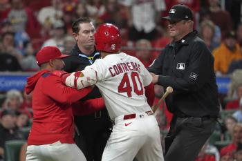 What kind of immoral behavior is this? It's a mistake, but STL's designated hitter's frowned upon throwing the bat at his team's coach