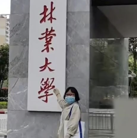 Woman Wins Graduate School with Son Book after Burns Lose Arm Function