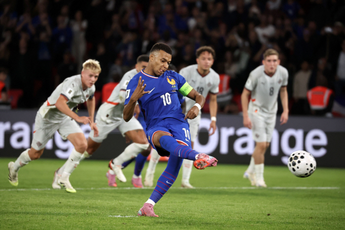 The son of the father of what is the legend of what has happened, Eidur Gudjonsen, scored against France for Iceland...A total of 52 goals in the three-way A-match