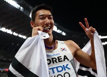 What a waste! 2cm Woo Sang-hyuk World Championship 2m34, Shining! Smile Jumper's golden sportsmanship 
