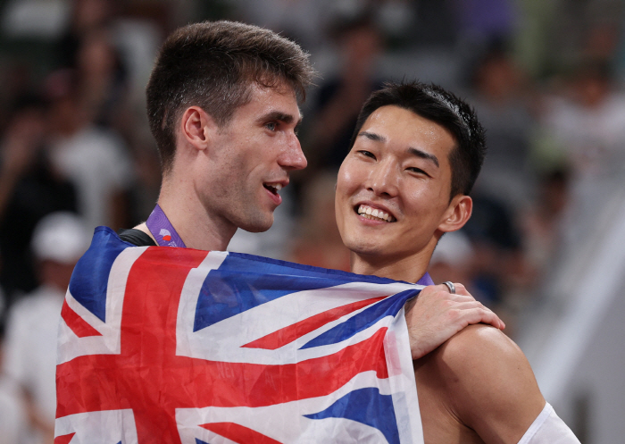 What a waste! 2cm Woo Sang-hyuk World Championship 2m34, Shining! Smile Jumper's golden sportsmanship 