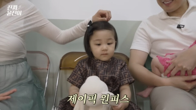 Yunjin, 27 months old daughter and luxury dress..My husband is adamant that Burberry and Montclair don't work