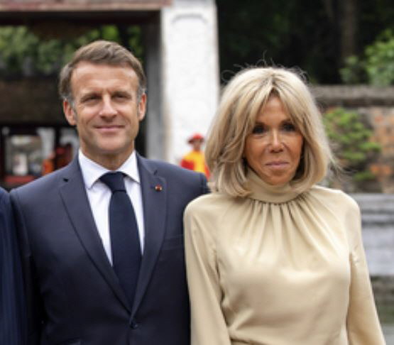French First Lady Submits Confident Female Proof Photo to Male Suspicion...a libel suit
