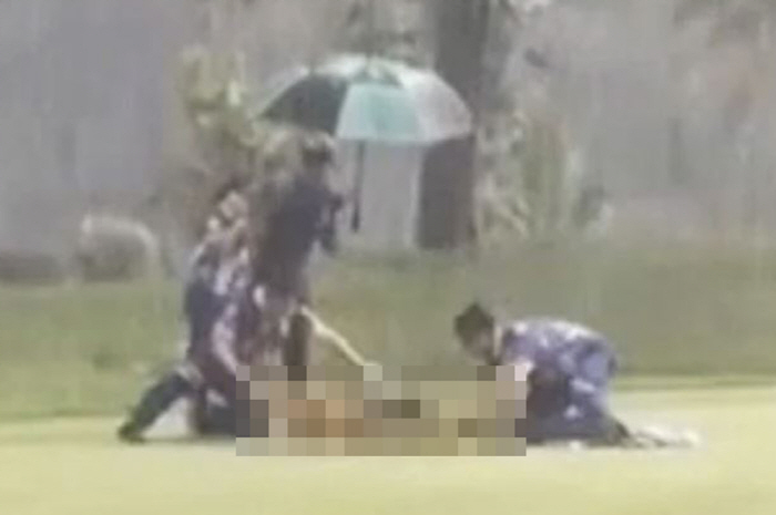 Caddie who was struck by lightning on the golf course dies...Controversy over forced play amid heavy rain