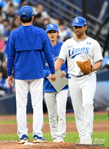  Garabito takes the mound in the 8th inning