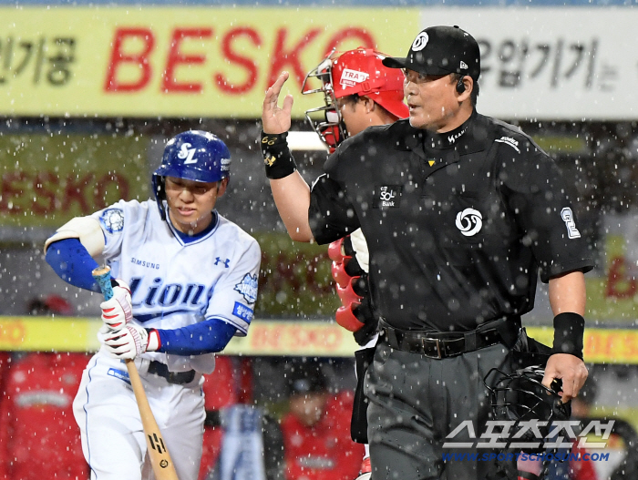  A game where rain stops at the end of the first inning