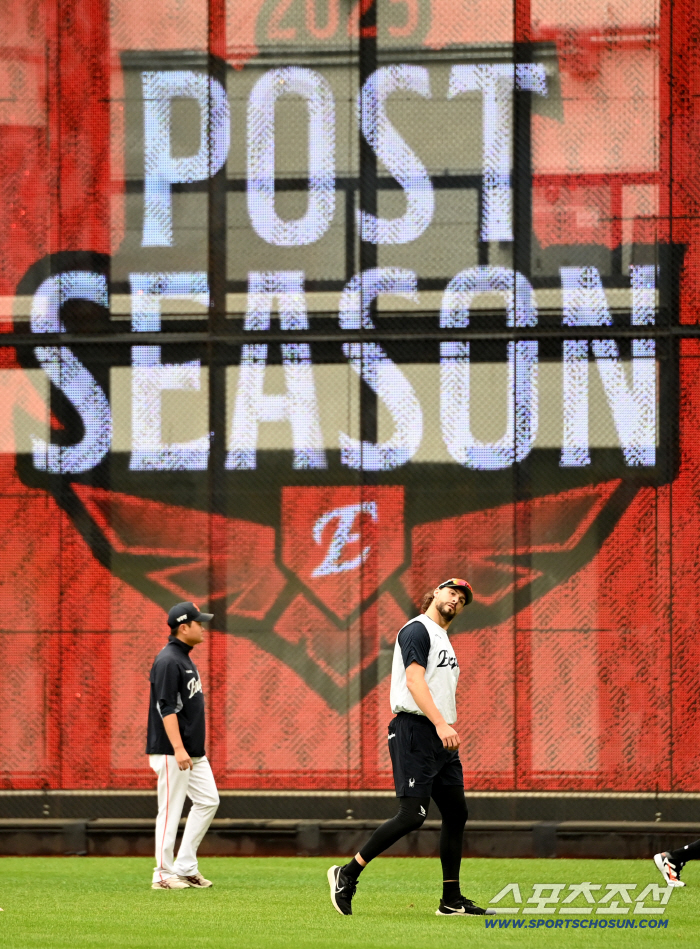  Weiss warms up on the ground where it stopped raining