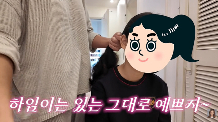 Baek Ji-young's 9-year-old daughter looks prettier before plastic surgery. (Baek Ji-young)