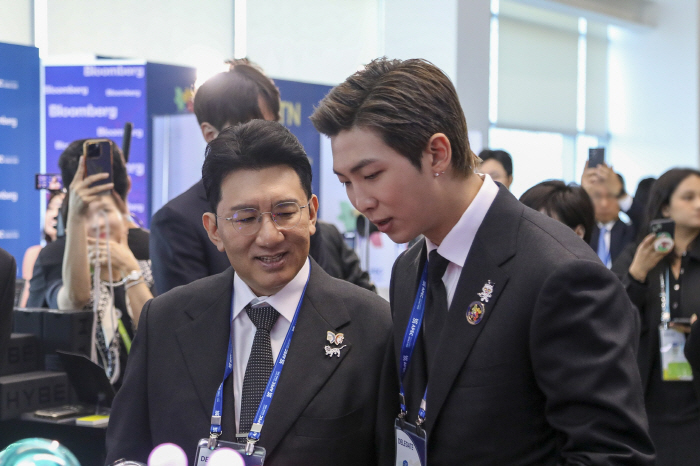 HYBE Chairman Bang Si-hyuk and BTS RM Visit HYBE Booth at APEC CEO Summit