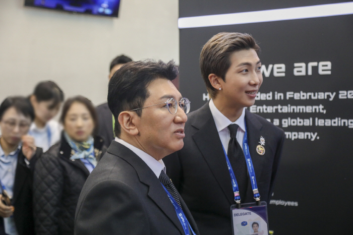 HYBE Chairman Bang Si-hyuk and BTS RM Visit HYBE Booth at APEC CEO Summit