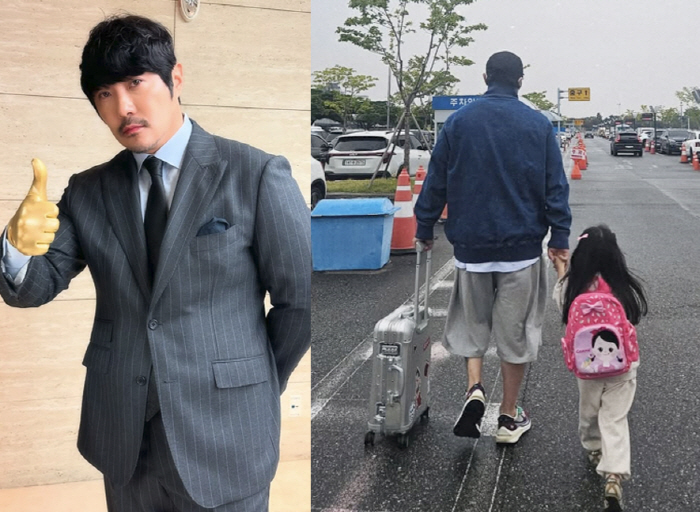 KCM holds her daughter's first open hand for 12 years and is happiest in a normal moment