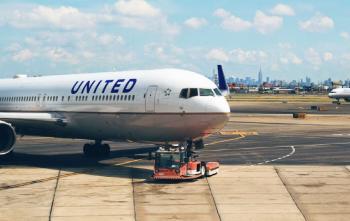 Cabin laptop, drop into cargo compartment...Returned an hour after takeoff