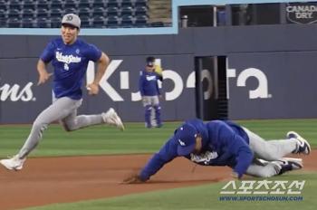 The director's cover-up in the brink of a cliffhanger. Everyone is laughing during the running competition with Kim Hye-sung