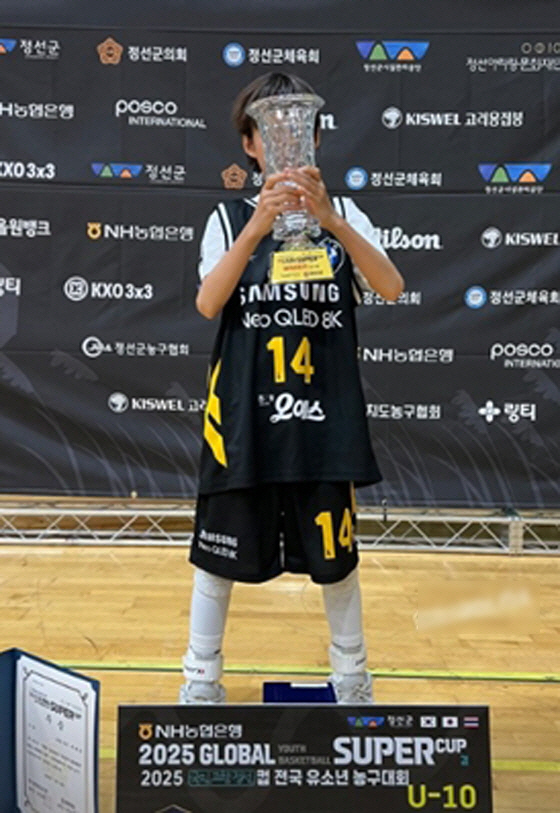 Agent Lee, 9 years old. There's a reason why you're handsome. You look like your mom