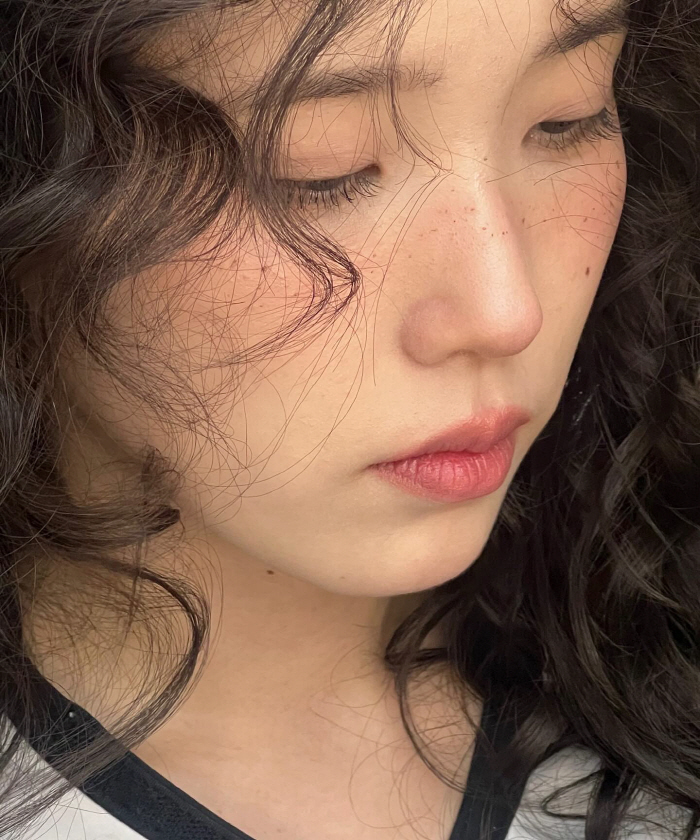 IU Reveals Diverse Looks and Behind-the-Scenes Moments in Latest SNS Update