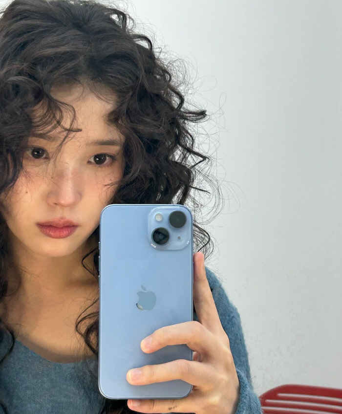 IU Reveals Diverse Looks and Behind-the-Scenes Moments in Latest SNS Update