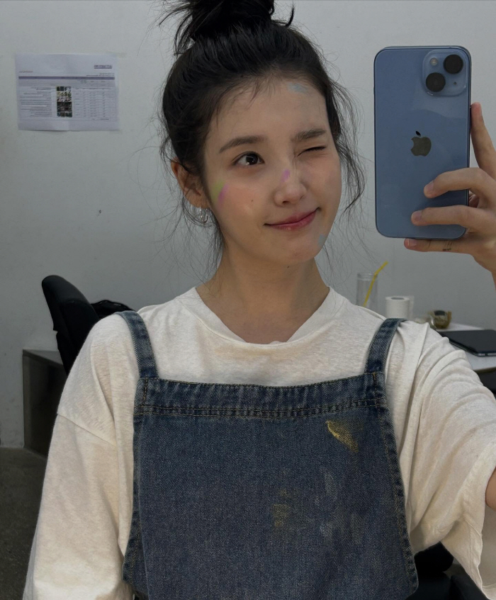 IU Reveals Diverse Looks and Behind-the-Scenes Moments in Latest SNS Update