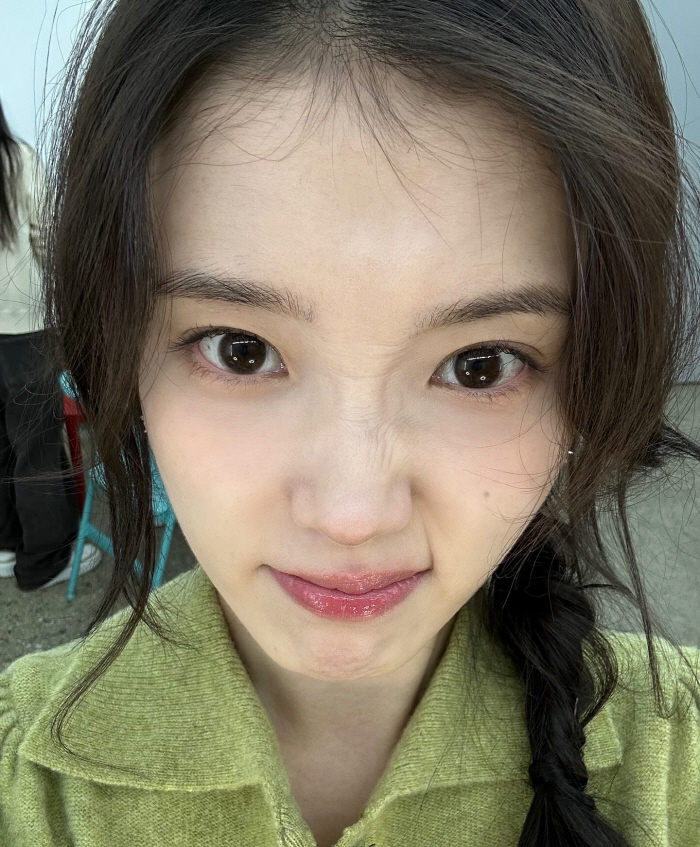 IU Reveals Diverse Looks and Behind-the-Scenes Moments in Latest SNS Update