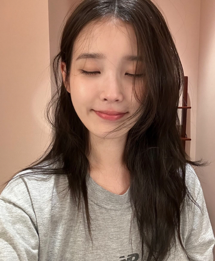 IU Reveals Diverse Looks and Behind-the-Scenes Moments in Latest SNS Update