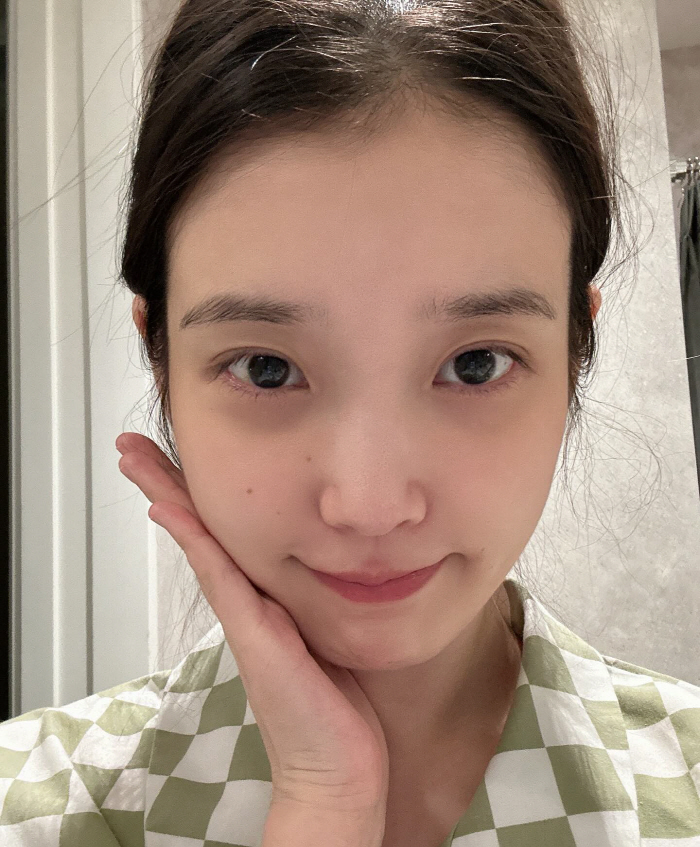 IU Reveals Diverse Looks and Behind-the-Scenes Moments in Latest SNS Update