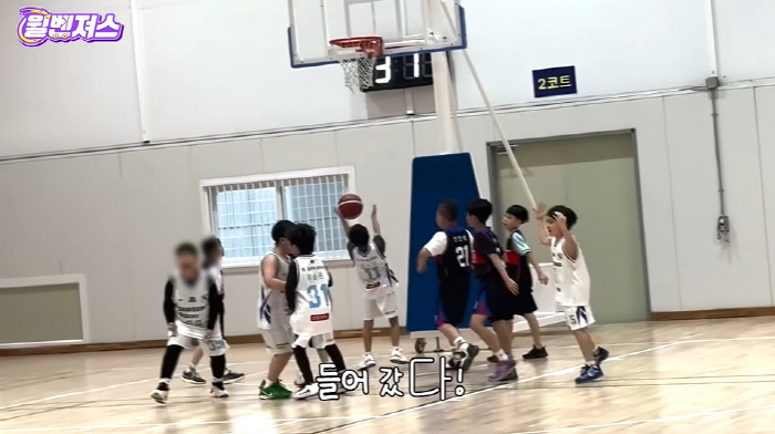Sam Hammington, 8th-year-old Bentley scores 2 goals in basketball
