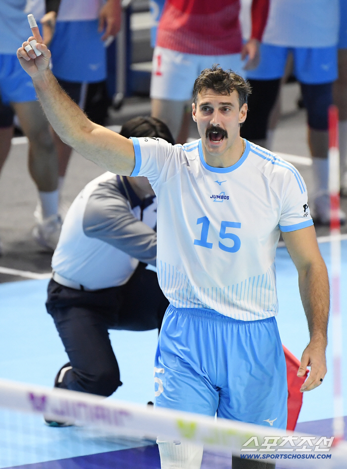  Russell cheers after scoring