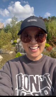 Park Mi-sun, who is fighting breast cancer, has covered up her hair with a hat...Riding a bike with my son