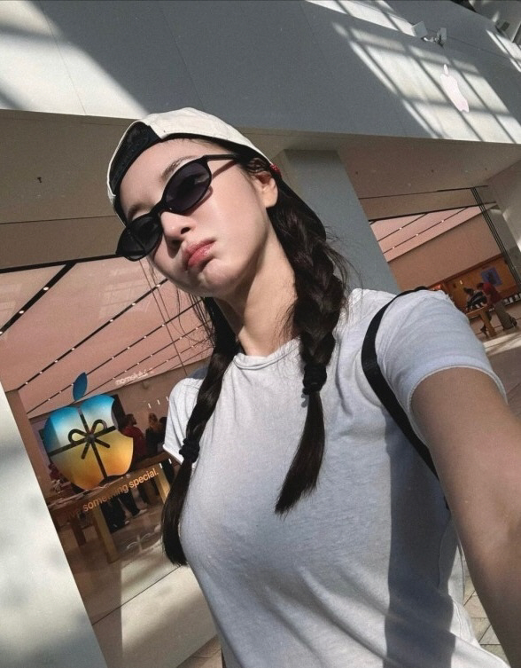 Kim Yun-ji styling pigtails and ball caps... How are you doing in LA, where you look so young